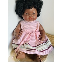 Doll dressed in Pink Stripe Dress